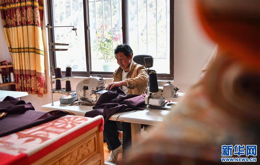 (決戰(zhàn)決勝脫貧攻堅(jiān)·圖文互動(dòng))(2)搬出來的“幸福村”