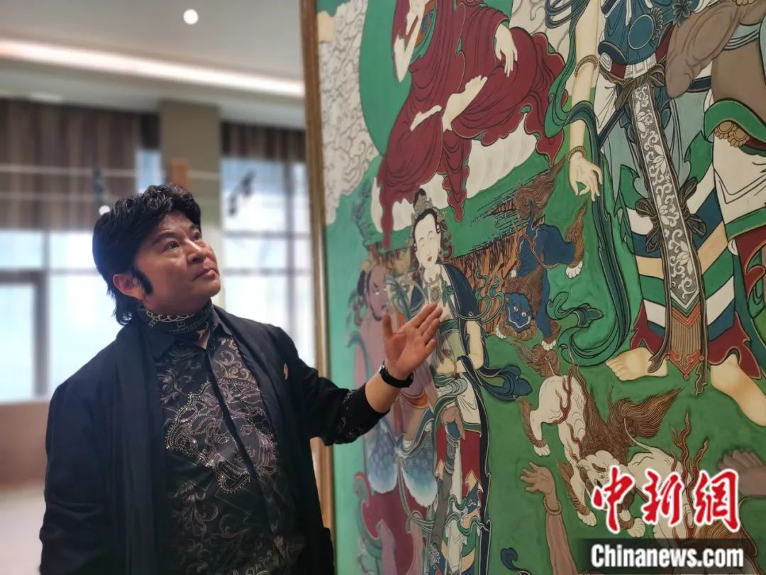國家一級美術(shù)師劉觖。張?zhí)砀?攝
